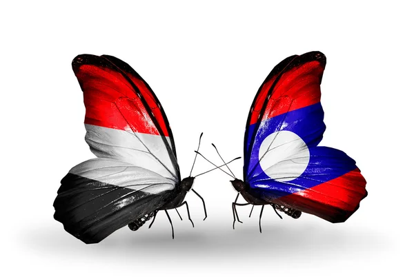 Butterflies with  Yemen and  Laos flags on wings — Stock Photo, Image