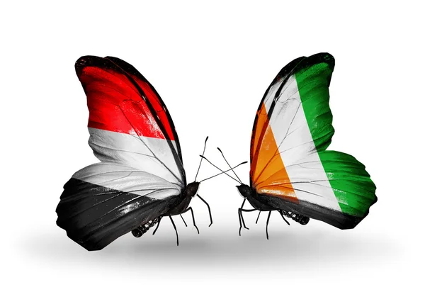 Farfalle con le bandiere dello Yemen e della Costa Divina sulle ali — Foto Stock