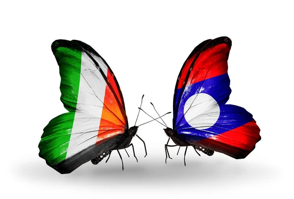 Mariposas con banderas de Irlanda y Laos en alas — Foto de Stock