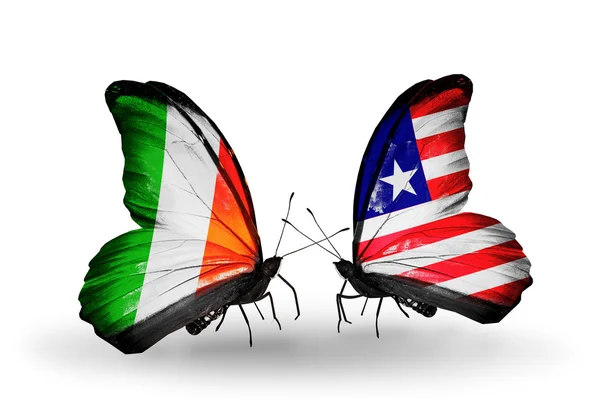 Kelebek kanatları üzerinde İrlanda ve Liberya bayraklı — Stok fotoğraf