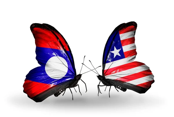 Butterflies with Laos and Liberia flags on wings — Stock Photo, Image