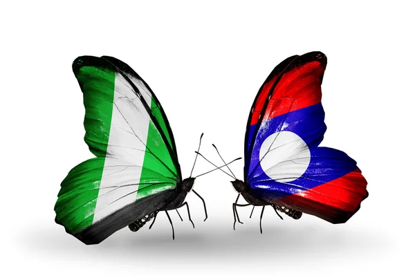 蝴蝶翅膀上的尼日利亚和老挝标志 — 图库照片