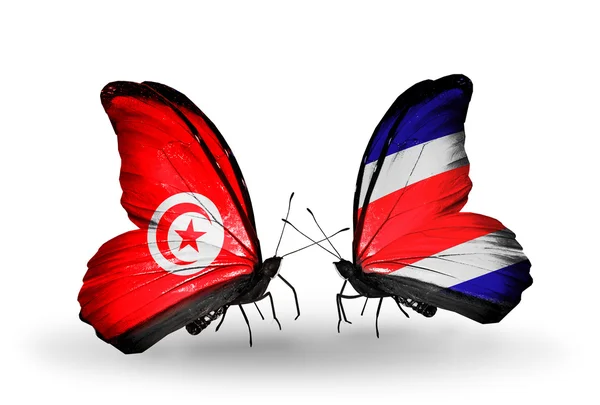 Butterflies with Tunisia and Costa Rica flags on wings — Stock Photo, Image