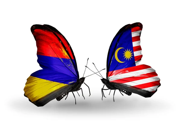 Butterflies with Armenia and  Malaysia flags on wings — Stock Photo, Image