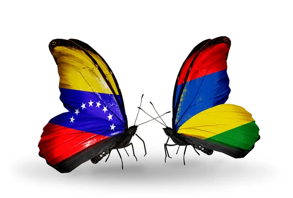 Papillons avec drapeaux Venezuela et Maurice sur les ailes — Photo