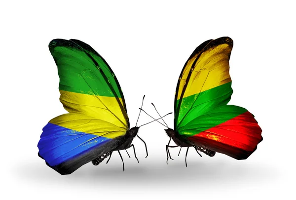 Butterflies with Gabon and Lithuania flags on wings — Stock Photo, Image