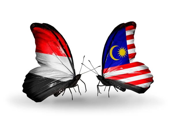 Butterflies with Yemen and  Malaysia flags on wings — Stock Photo, Image