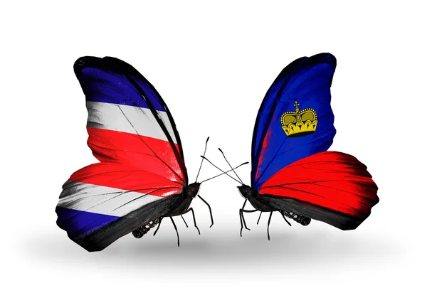 Butterflies with Costa Rica and Liechtenstein flags on wings — Stock Photo, Image