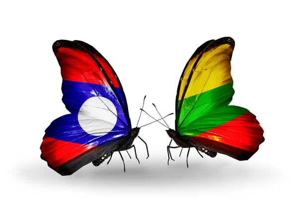 Papillons avec drapeaux Laos et Lituanie sur les ailes — Photo