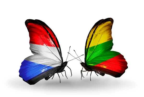 Butterflies with Luxembourg and  Lithuania flags on wings — Stock Photo, Image