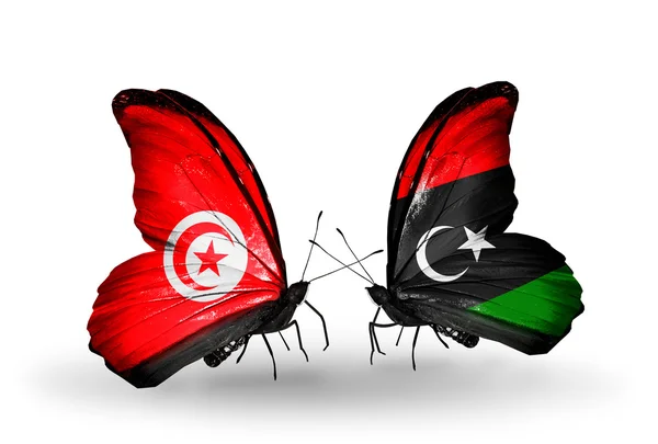 Papillons avec drapeaux Tunisie et Libye sur les ailes — Photo