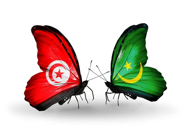 Farfalle con bandiere Tunisia e Mauritania sulle ali — Foto Stock