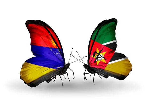 Butterflies with Armenia and  Mozambique flags on wings — Stock Photo, Image