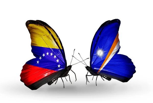 Butterflies with Venezuela and Marshall islands flags on wings — Stock Photo, Image