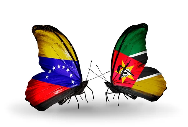 Motyle z Wenezueli i Mozambiku flagi na skrzydłach — Zdjęcie stockowe
