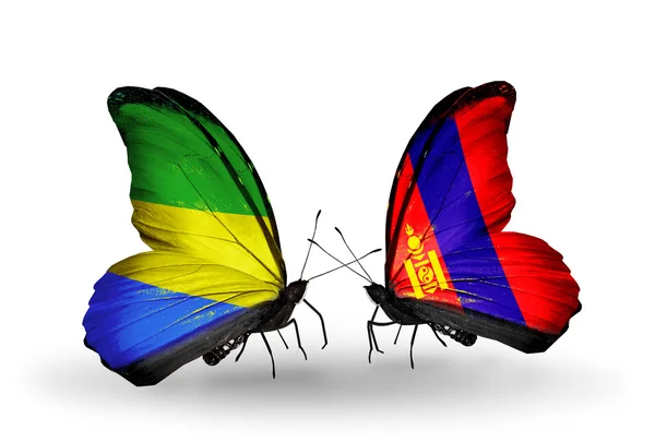 Butterflies with Gabon and Mongolia flags on wings — Stock Photo, Image