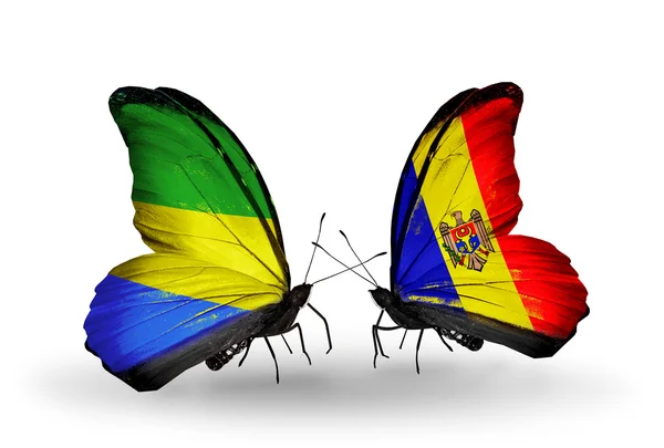 Butterflies with Gabon and Moldova flags on wings — Stock Photo, Image