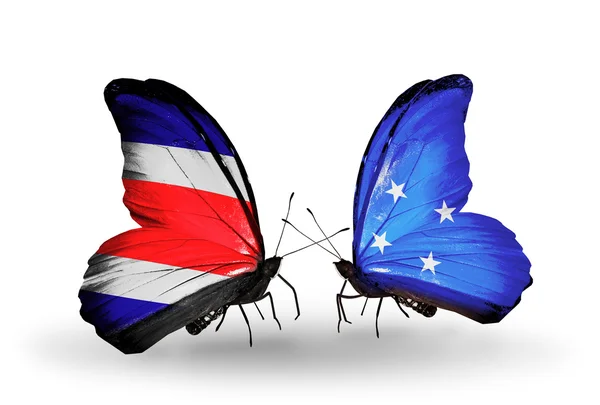 Mariposas con banderas de Costa Rica y Micronesia en alas — Foto de Stock