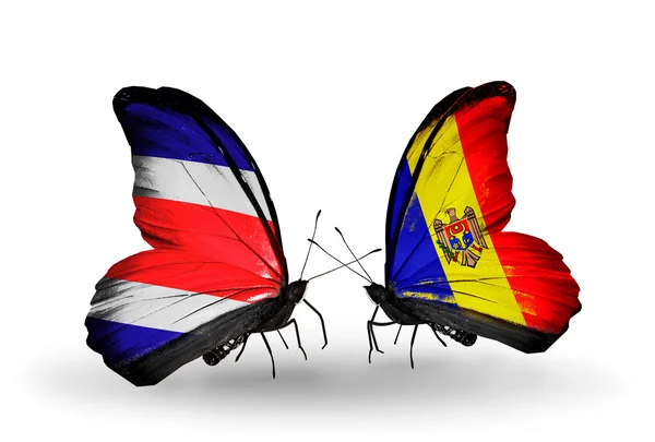 Papillons avec des drapeaux Costa Rica et Moldavie sur les ailes — Photo