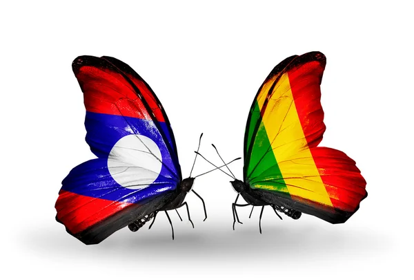 Motyle z flagi Laosu i mali na skrzydłach — Zdjęcie stockowe