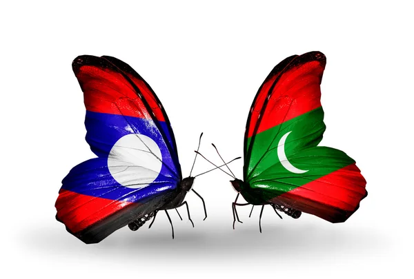 Butterflies with Laos and Maldives flags on wings — Stock Photo, Image