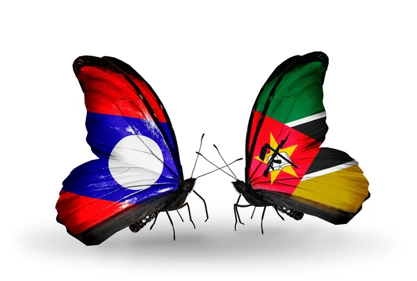 Mariposas con banderas de Laos y Mozambique en alas — Foto de Stock