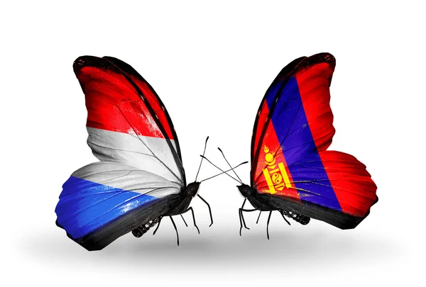 Mariposas con banderas de Luxemburgo y Mongolia en alas —  Fotos de Stock