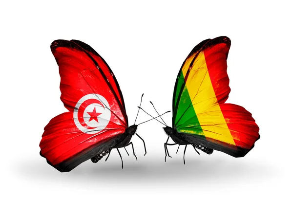 Бабочки с флагами Туниса и Мали на крыльях — стоковое фото