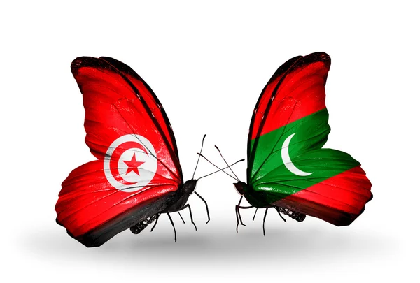 Butterflies with Tunisia and Maldives flags on wings — Stock Photo, Image