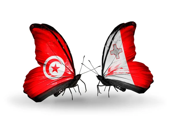 Farfalle con bandiere Tunisia e Malta sulle ali — Foto Stock