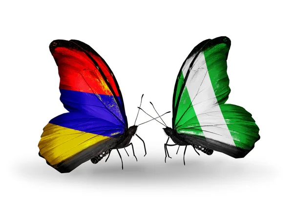 Butterflies with Armenia and  Nigeria flags on wings — Stock Photo, Image