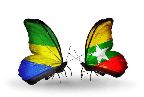 Borboletas com bandeiras Gabão e Mianmar em asas — Fotografia de Stock