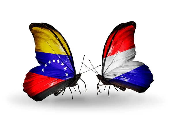 Mariposas con banderas de Venezuela y Holanda en alas —  Fotos de Stock