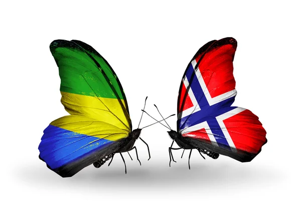 Papillons avec drapeaux Gabon et Norvège sur les ailes — Photo