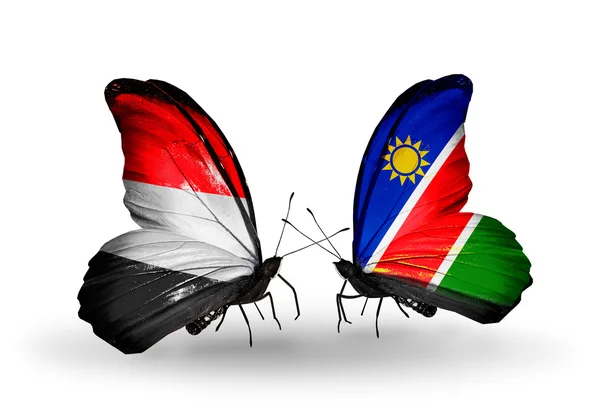 Mariposas con banderas de Yemen y Namibia en alas — Foto de Stock