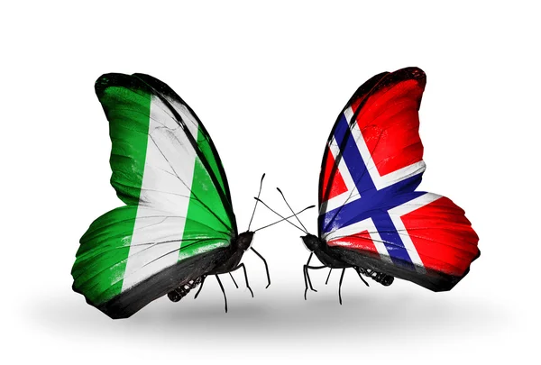 Butterflies with Nigeria and Norway flags on wings — Stock Photo, Image