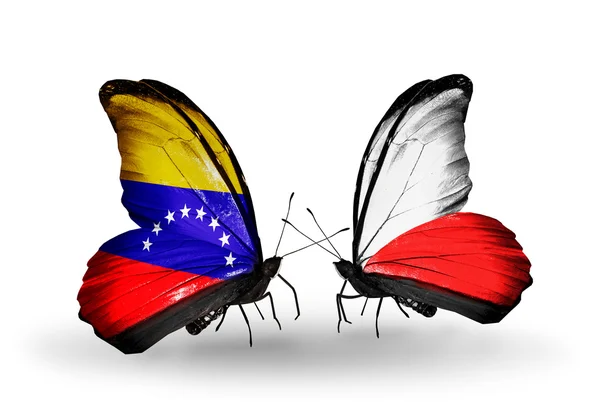 Farfalle con bandiere Venezuela e Polonia sulle ali — Foto Stock