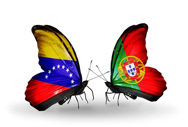 Motýli s Venezuelou a Portugalsko vlajky na křídlech — Stock fotografie