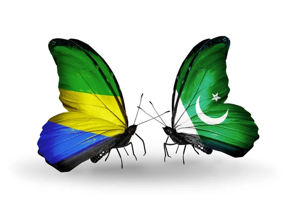 Papillons avec drapeaux Gabon et Pakistan sur les ailes — Photo