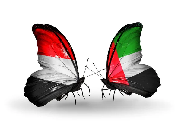 Butterflies with Yemen and  United Arab Emirates flags on wings — Stock Photo, Image