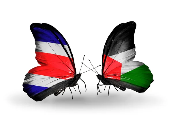 Borboletas com bandeiras da Costa Rica e Palestina em asas — Fotografia de Stock