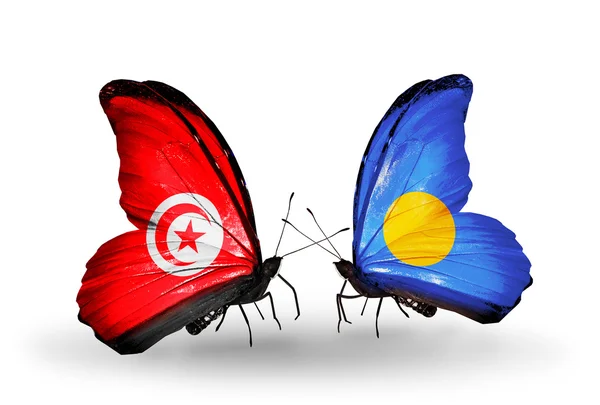 Butterflies with Tunisia and Palau flags on wings — Stock Photo, Image