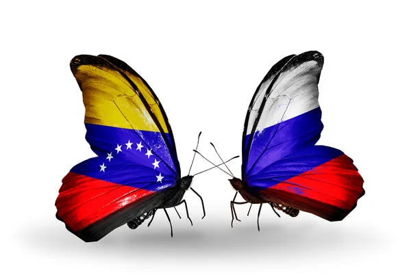 Mariposas con banderas de Venezuela y Rusia en alas —  Fotos de Stock