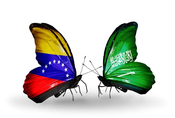 Farfalle con bandiere Venezuela e Arabia Saudita sulle ali — Foto Stock