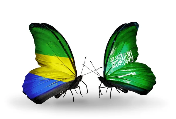 Kelebek kanatları üzerinde gabon ve Suudi Arabistan bayrağı ile — Stok fotoğraf