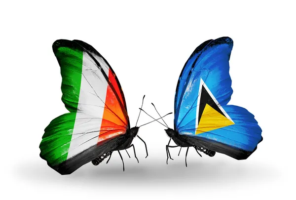 Butterflies with Ireland and  Saint Lucia flags on wings — Stock Photo, Image