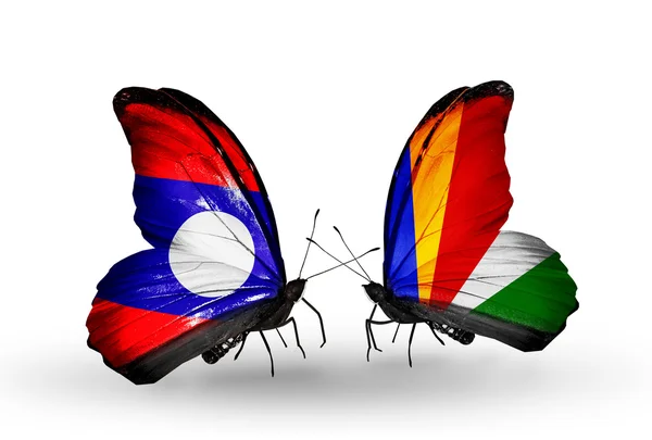 Mariposas con banderas de Laos y Seychelles en alas —  Fotos de Stock