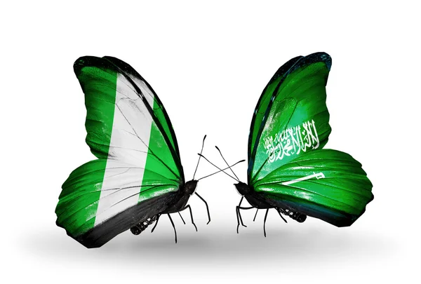 Mariposas con banderas de Nigeria y Arabia Saudita en alas — Foto de Stock