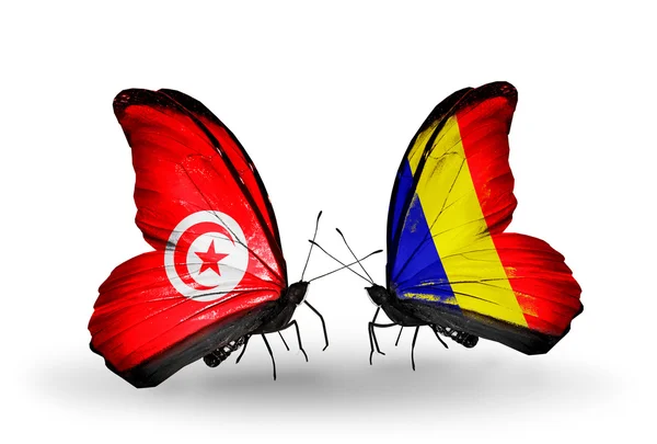 Schmetterlinge mit Thunfisch und Tschad, rumänische Flaggen auf Flügeln — Stockfoto