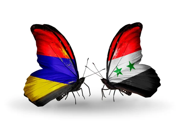 Vlinders met Armenië en Syrië vlaggen op vleugels — Stockfoto